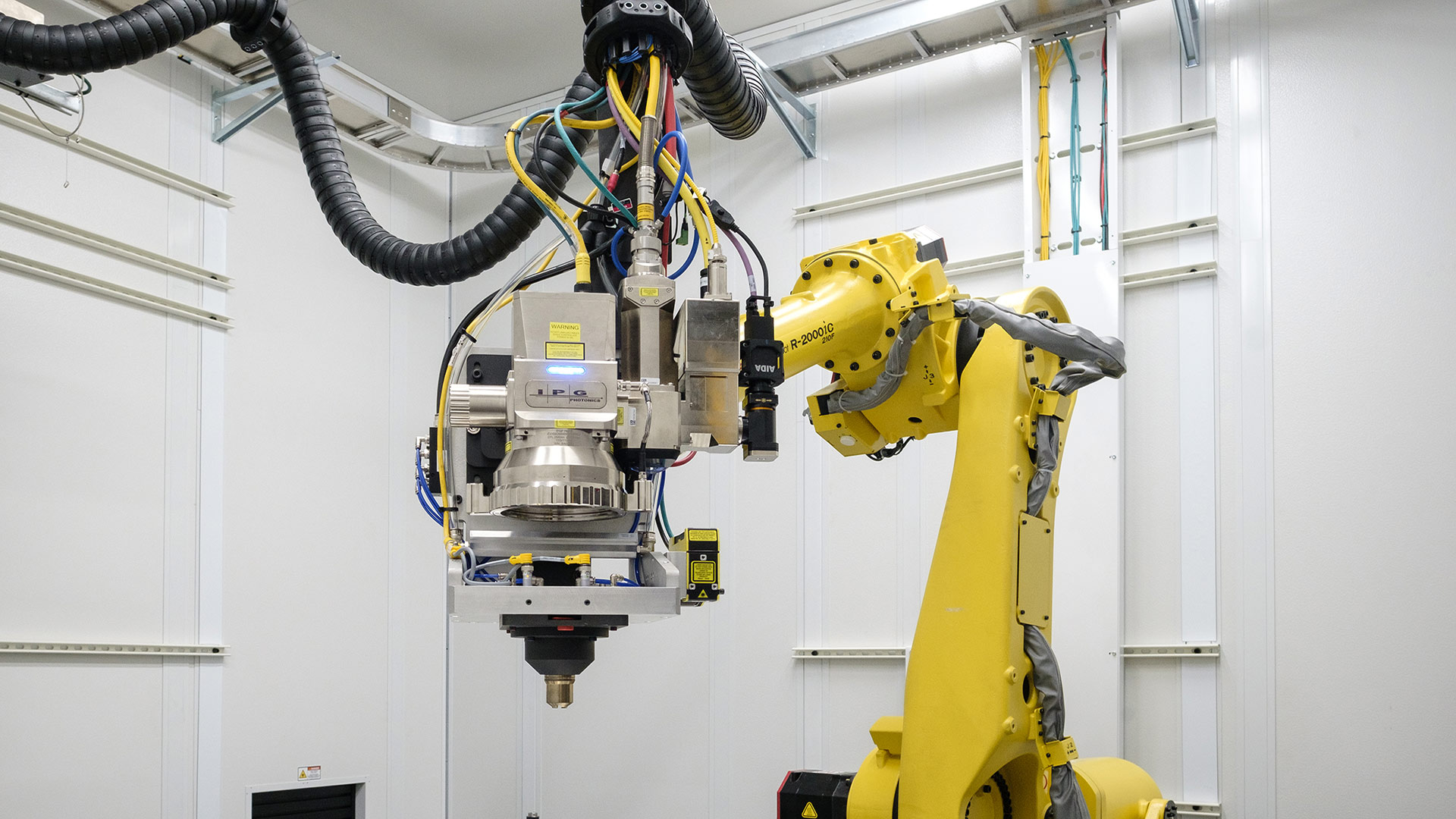 A six axis robotic laser system with IPG scanning optics